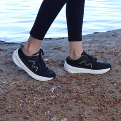 womens black walking sneakers with white soles